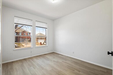 Unfurnished room with light wood-type flooring