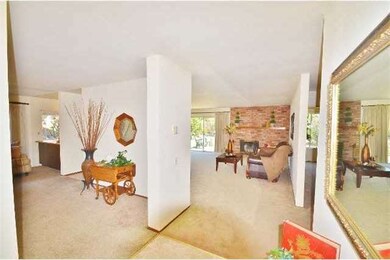 Entry looking into the living room and family room
