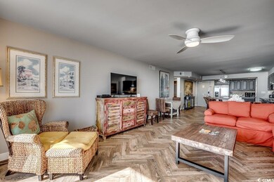 Living room featuring light parquet flooring and c