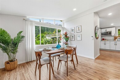 What you don't see is that this dining area overlooks the garden beds and the Koolaus. Perfect setting for indoor dining.