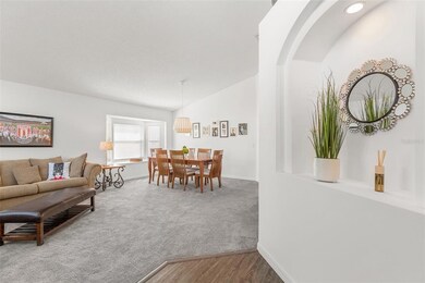 Foyer leads to formal living/dining room combination