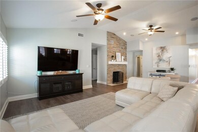 Open concept living areas with vaulted ceilings.