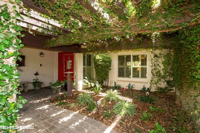 Intimate & Lushly Landscaped Entrance