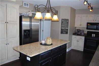 Gorgeous wide plank hard wood floors, Elegant cabi