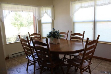 Large, formal dining room with nice windows