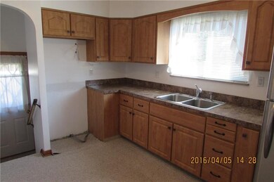 Updated kitchen that shows access to home's side e