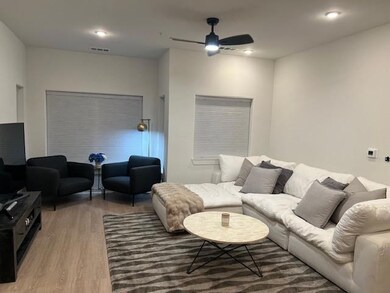 Living area featuring light wood-style floors and