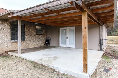 312 Memorial Dr, Wake Village, TX 75501 - photo 2