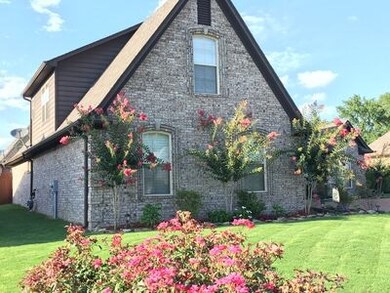Beautiful lush landscaping surrounds this home!