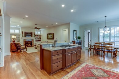 Gather everyone together in this kitchen which ove