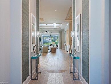 Foyer with inlaid mosaic flooring