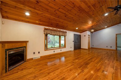 Enter into the spacious living room where the vaul