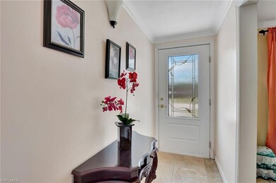 Doorway featuring ornamental molding