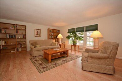 Windows facing the front lawn allow natural light 