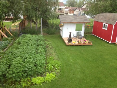 back yard garden with sheds