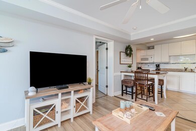 Living room featuring recessed lighting, a ceiling
