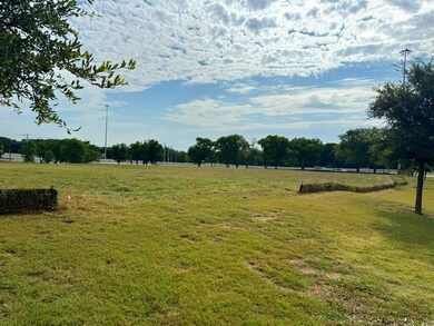 View of grassy yard featuring a view of rural / pastoral area