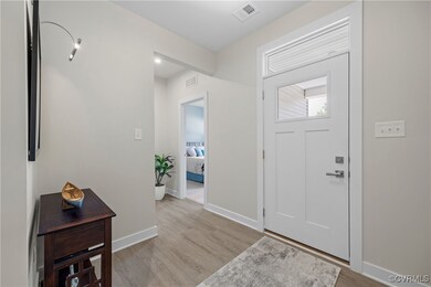 Foyer entrance looking into the second bedroom