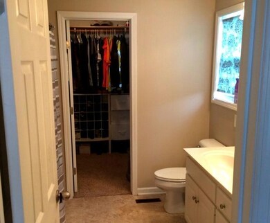 Master Bath with large walk-in closet and large linen closet.