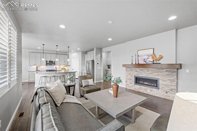 3-car-garage end unit patio home!