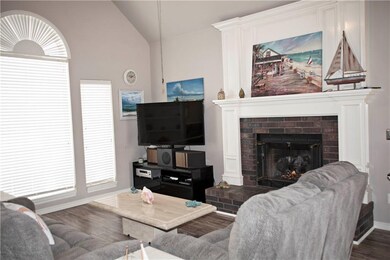 View of living room from kitchen dining.