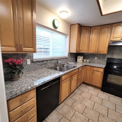 Step into the recently renovated granite kitchen.