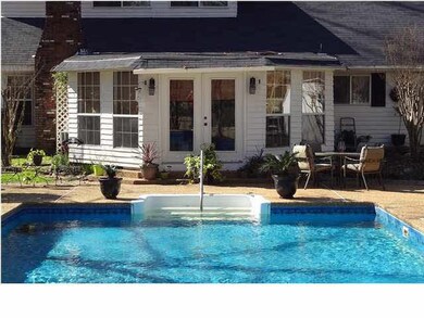 Sun room and 20' x 40' pool.