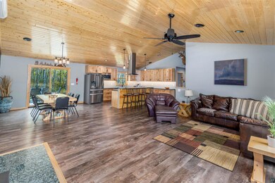 Living room with wood ceiling, a wealth of natural