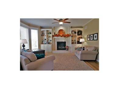 Cozy living room featuring gas fireplace with blow