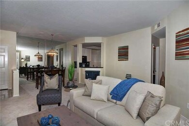 View of living room with peek at the kitchen
