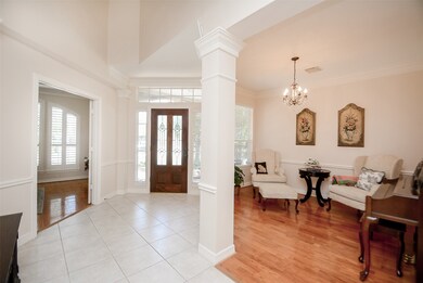 Nice crown molding touches in the foyer. Shown her