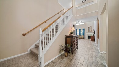Tall ceilings and open stairs are both welcoming and regal.