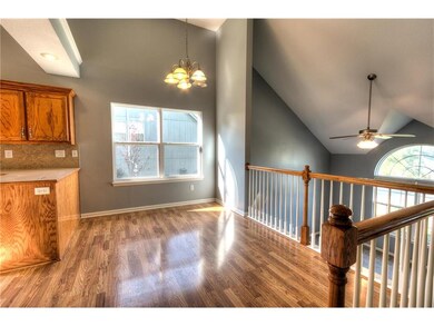 Wood floors continue into the eating area
