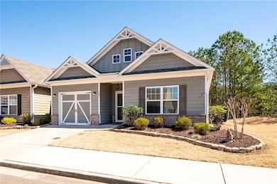Sought after end unit with additional side yard