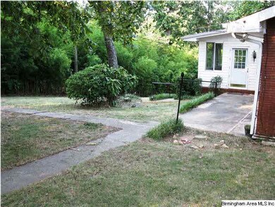 Patio, sidewalks, and private fenced back yard