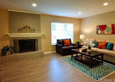LARGE LIVING ROOM WITH FIREPLACE, RECESSED LIGHTIN