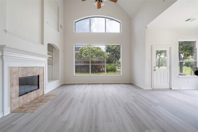 This spacious and bright living room features high