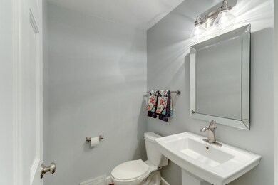 Powder room adjacent to the kitchen.