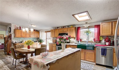 Newer stainless steel appliances. Kitchen window l