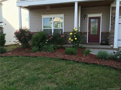 Relax on this front porch while taking in the beau