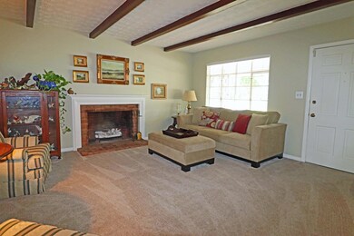 Living Room with beamed ceiling