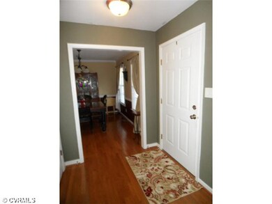 Foyer - Foyer with wood floors