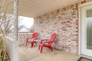 multiple sitting areas on the back porch