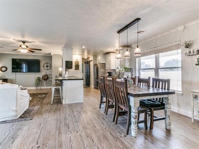 Beautiful wood look floors; open living & kitchen