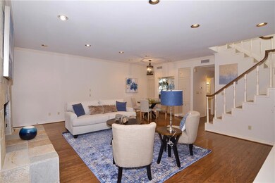 Hardwood flooring and newly painted walls and ceil