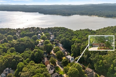 Aerial perspective of suburban area featuring a water and mountain view and property parcel outlined