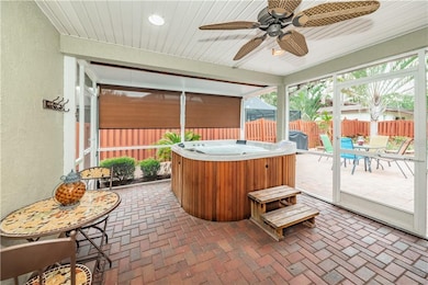 Covered and Screened Lanai with hot tub