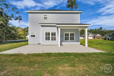 covered back porch with extended back patio