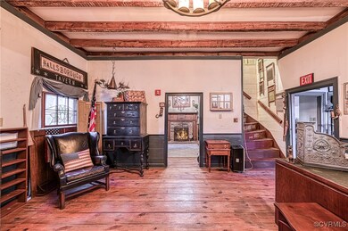 Heart of pine floors, beamed ceiling, fireplace