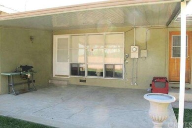 Covered Patio for Entertaining with a Door into th